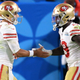 Jimmy Garoppolo (l.) and Deebo Samuel